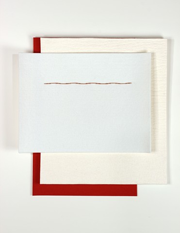 simple geometric composition in red and white felt