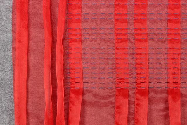 grey felt and red organza fiber art by Yvette Kaiser Smith