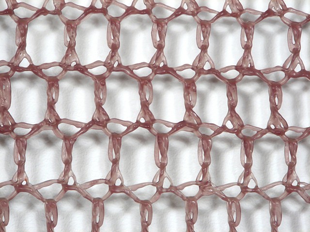 Crocheted fiberglass and polyester resin grid wall sculpture  by Yvette Kaiser Smith