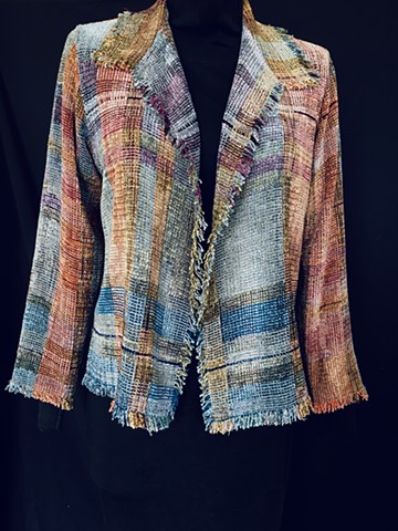 Handwoven fringed jacket of rayon chenille, cotton and bamboo yarns