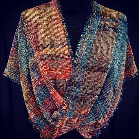 Handwoven twisted shawl of rayon chenille, cotton and bamboo. Knotted fringe.