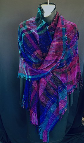 Handwoven triangle shawl of rayon chenille, cotton and bamboo yarns. 