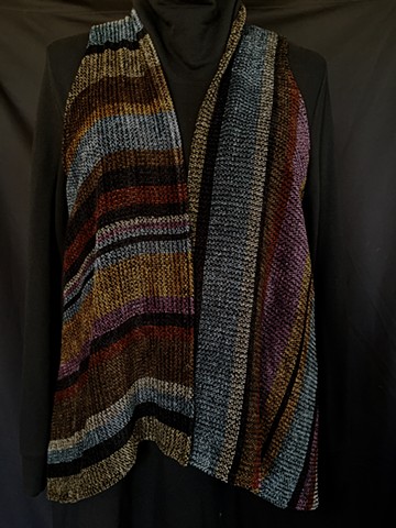 Handwoven long vest of rayon chenille, cotton and bamboo yarns.