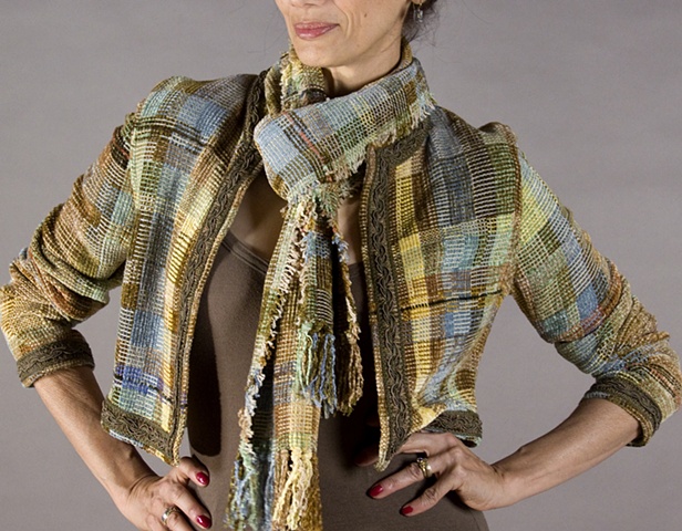 Handwoven jacket of rayon chenille and cotton yarns. Can be sold separately. Jacket - $295, scarf $70.