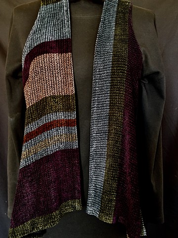 Handwoven long vest of rayon chenille, cotton and bamboo yarns.