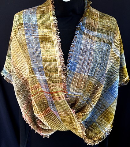 handwoven twisted shawl of rayon chenille, cotton and bamboo. Knotted fringe.
