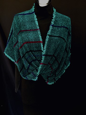 handwoven twisted shawl of rayon chenille, cotton and bamboo. Knotted fringe.