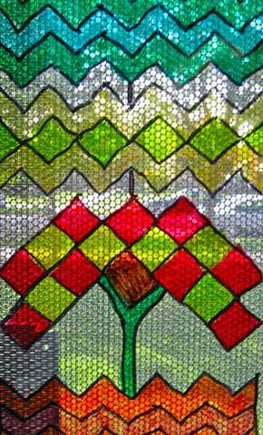 5th grade Chicago Public School students planned and created flora designed imitation stained glass windows using a grid, symmetry, and geometric shapes