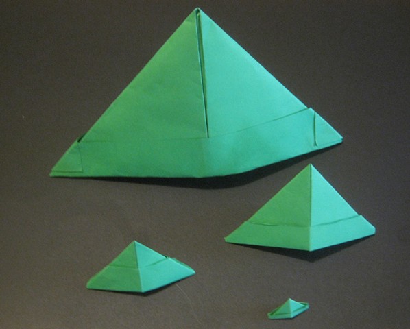 Similar green triangular paper hats