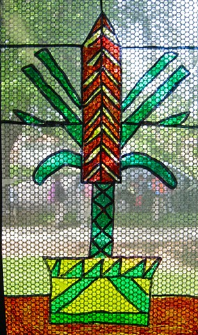 5th grade Chicago Public School students planned and created flora designed imitation stained glass windows using a grid, symmetry, and geometric shapes