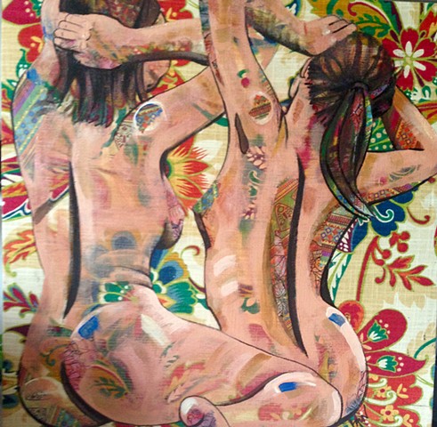 Back View of twin nude women on fabric.