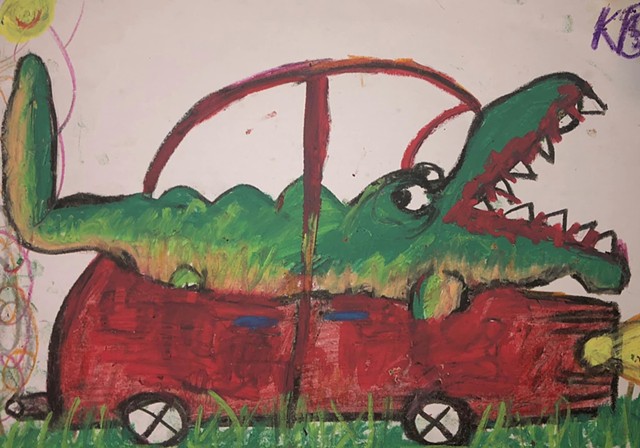 crocodile in little red car
