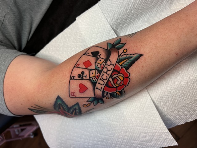 Playing cards tattoo by Jason Ziegler