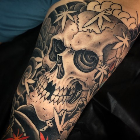 Skull Tattoo  by Fran Massino at stay humble tattoo company in baltimore maryland the best tattoo shop and artist in baltimore maryland specializing in Japanese tattoo black and Grey