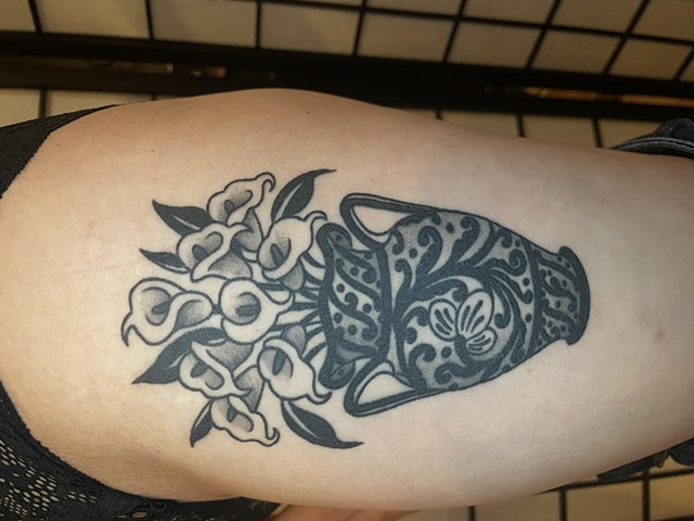 Healed lily vase tattoo by Alecia Thomasson