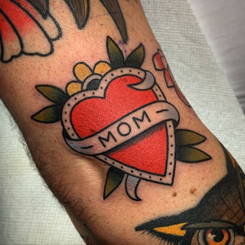 traditional mom heart tattoo by tattoo artist dave wah at stay humble tattoo company in baltimore maryland the best tattoo shop in baltimore maryland