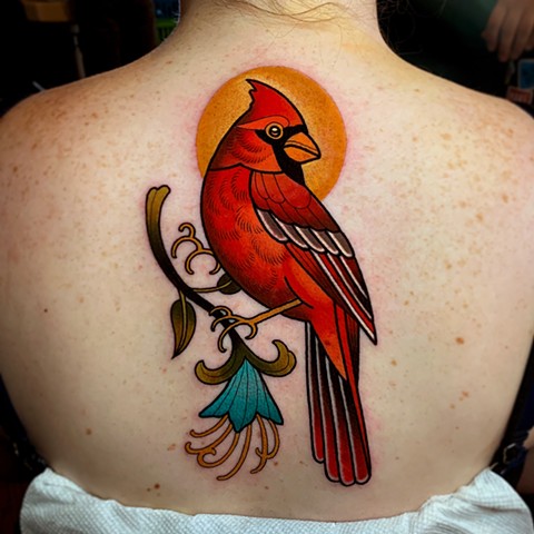 cardinal bird tattoo by dave wah at stay humble tattoo company in baltimore maryland the best tattoo shop and artist in baltimore maryland