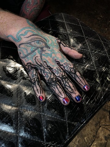 Abstract hand tattoo by Connie Kang 