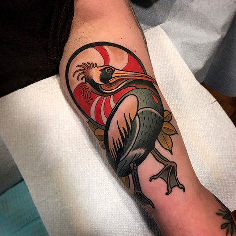 pelican tattoo by dave wah at stay humble tattoo company in baltimore maryland the best tattoo shop and artist in baltimore maryland