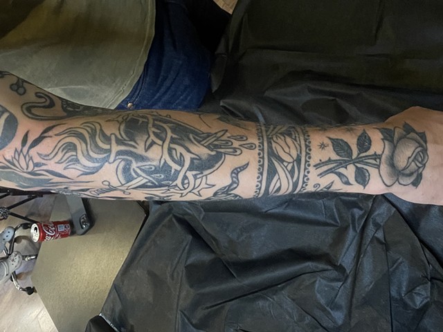 flower band tattoo on wrist | Wrist band tattoo, Hand tattoos, Tattoos for  guys