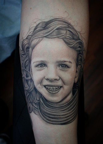 black and grey portrait tattoo by dave wah at stay humble tattoo company in baltimore maryland