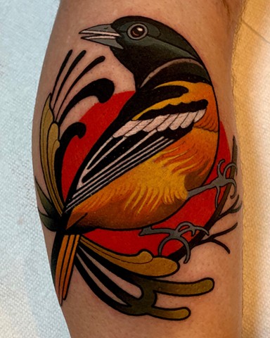 oriole bird tattoo by dave wah at stay humble tattoo company in baltimore maryland the best tattoo shop and artist in baltimore maryland