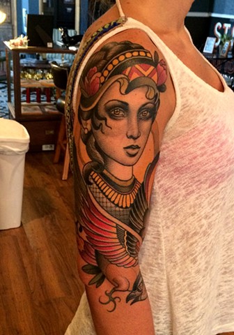 girl and bird tattoo by tattoo artist dave wah at stay humble tattoo company the best tattoo shop in baltimore maryland