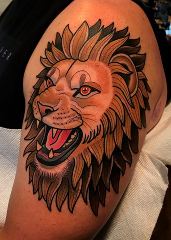 lion tattoo by dave wah at stay humble tattoo company in baltimore maryland the best tattoo shop and artist in baltimore maryland