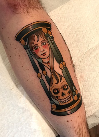 hourglass tattoo by tattoo artist dave wah at stay humble tattoo company the best tattoo shop in baltimore maryland