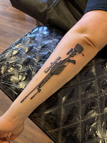 Gun tattoo by Connie Kang