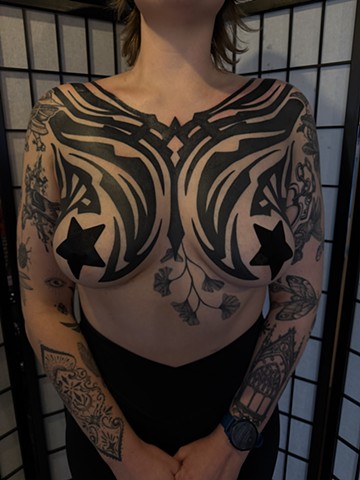 Tribal chest piece by Connie Kang