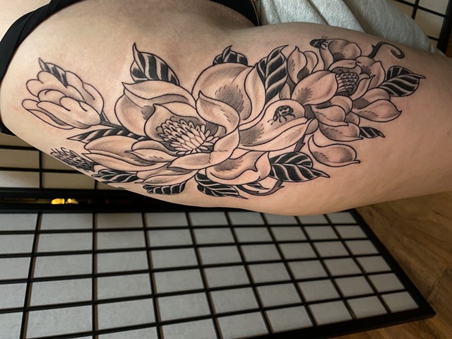 Magnolia with beetles tattoo by Alecia Thomasson