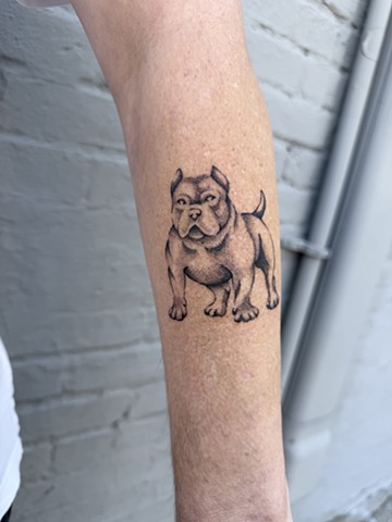 Dog tattoo by Connie Kang