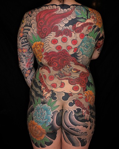 Japanese Shi shi food dog full back tattoo  by Fran Massino at stay humble tattoo company in baltimore maryland the best tattoo shop and artist in baltimore maryland specializing in Japanese tattoo