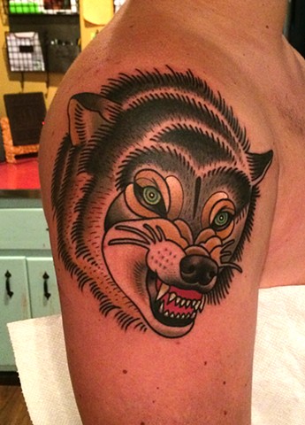 wolf tattoo by tattoo artist dave wah at stay humble tattoo company the best tattoo shop in baltimore maryland
