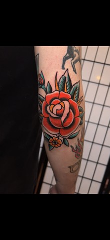 Rose tattoo by Jason Ziegler 