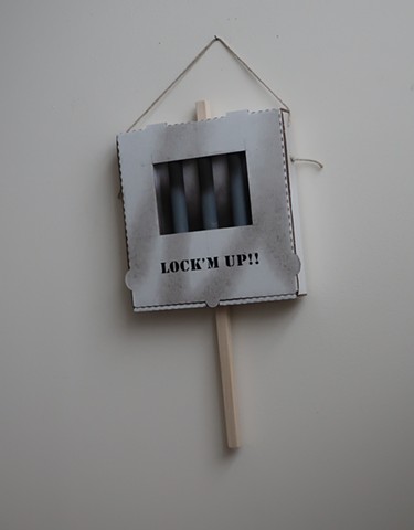 Robert Fields, "LOCK'M UP!!" 2019. 24" H X13" W X 12-1/4" D. Mixed media. Contemporary art, sculpture, wall mounted. Acknowledging the divisive conversations of the time.   
