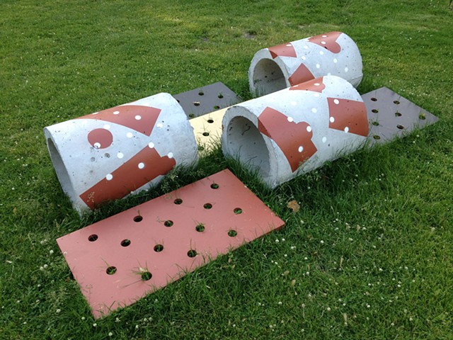 Public Art. An abstract sculpture of painted concrete and wood, on the lawn of The Evanston Art Center, "NOT HERE, THERE!" 2014, by Robert Fields.