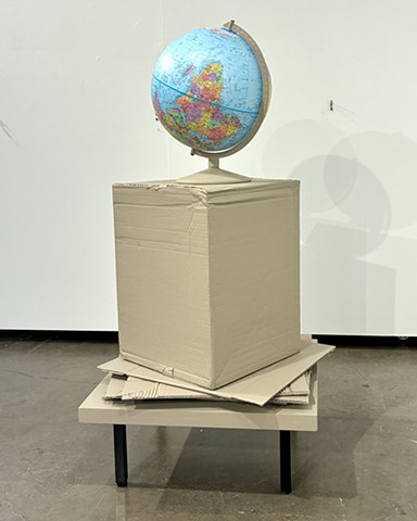 Contemporary art, conceptual art, minimalism, sculpture,  Bob Fields, "UNTITLED (Cancelled. Dump'm.), 2025. Acrylic latex paint, shellac, varnish, world globe (political / 2024), corrugated paperboard, wood, and metal, 42" x 28" x 28".