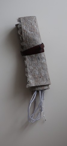 Robert Fields, 2020, Contemporary, Conceptual sculptural art. "Just you wait until... " 2020. Media: Tubing and cord wrapped in felt padding, bound with a leather belt. 34" H x 11" W x 7"D. 