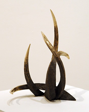 Five Curves is constructed from cast bronze