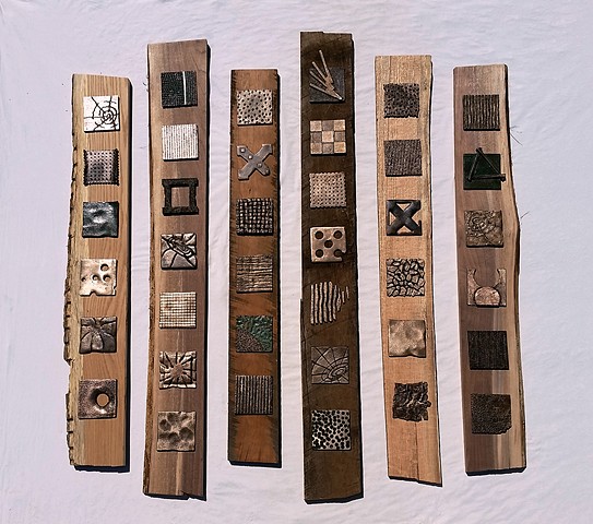 Family Tree created from cast bronze tiles and hardwood planks