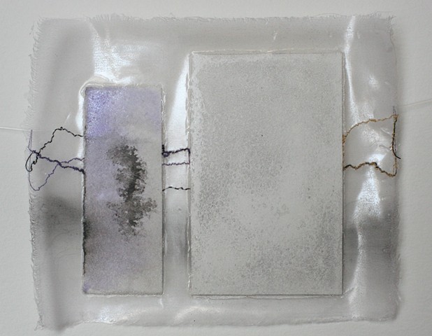 Small silk and paper drawing with violet ink and thread