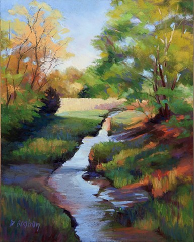 A stream running to river in September