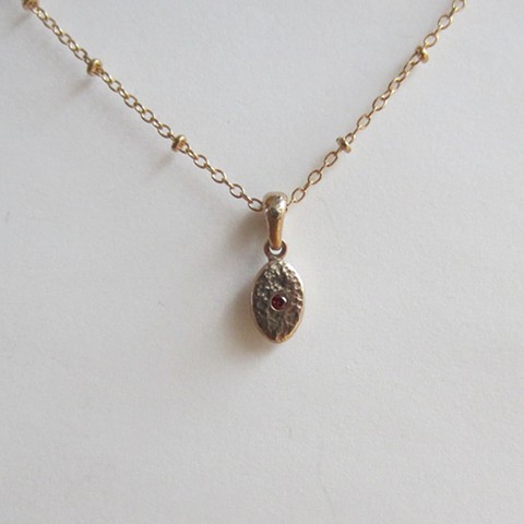 Tiny Golden Oval with Red CZ necklace