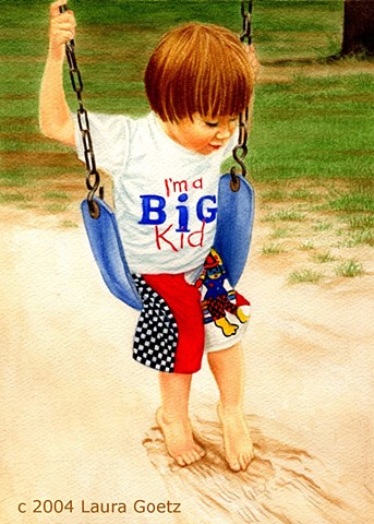 Little boy sits on a swing, and his feet play in the sand.