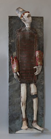 Wall mounted ceramic sculpture.    Photo credit: Jerry Cohen