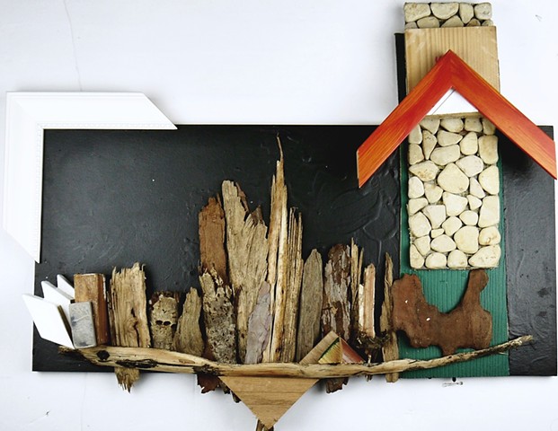 A spare architecture piece using found objects and paint to depict the NY City Skyline
