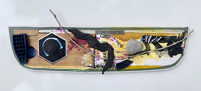 A mixed media piece depicting a ship in the ocean