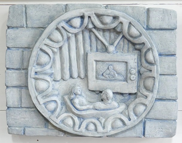 Clay relief with contemporary scene of domestic tv viewers in a classical rondel type, egg and dart frame
